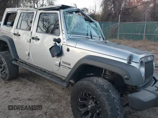 2018 Jeep Wrangler JK Unlimited Sport S with VIN 1C4BJWDG5JL862100, listed as a IAAI auction lot 40986228 with 1 mi miles. Bid and sale history available at carsss.com. Image 22.