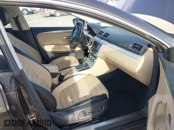 2013 Volkswagen CC Sport with VIN WVWBN7AN4DE516691, listed as a IAAI auction lot 41606473 with 109,711 mi miles and . Bid and sale history available at DreamBid. Image 5.