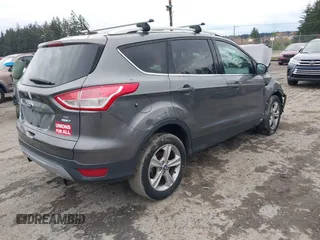 2013 Ford Escape SE with VIN 1FMCU9G92DUA54761, listed as a IAAI auction lot 41105062 with 131,767 mi miles. Bid and sale history available at carsss.com. Image 4.