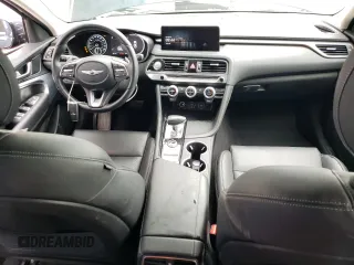 2023 Genesis G70 2.0T with VIN KMTG34TA4PU126996, listed as a Copart auction lot 69326704 with 24,882 mi miles and Non Repairable. Bid and sale history available at DreamBid. Image 8.