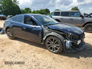 2016 Mazda 6 i Grand Touring с VIN JM1GJ1W55G1461719, выставлен на аукционе Copart как лот 58054385 с пробегом 102 641 миль миль и Списание • Salvage title. История ставок и продаж доступна на DreamBid. Изображение 4.