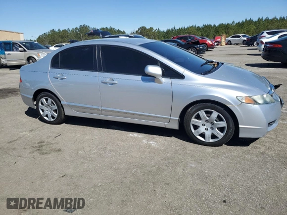 2010 Honda Civic LX with VIN 2HGFA1F51AH306669, listed as a Copart auction lot 50450825 with 143,659 mi miles and Salvage Title. Bid and sale history available at DreamBid. Image 4.