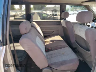 1992 Mazda MPV z VIN JM3LV5222N0453058, wystawiony jako Copart lot #72283634 z przebiegiem 174 084 mil mil oraz Szkody całkowita. Historia ofert i sprzedaży dostępna na DreamBid. Obrazek 11.