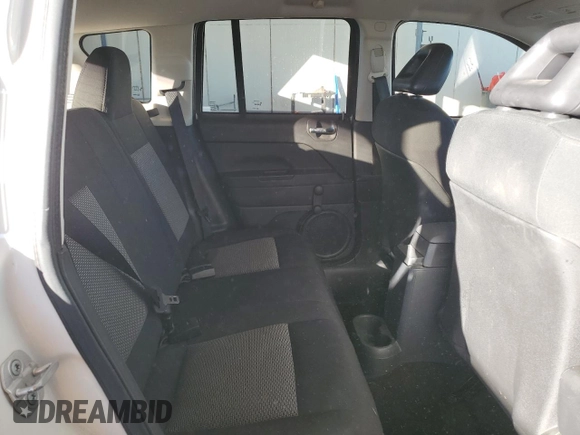 2009 Jeep Compass North with VIN 1J4FT47B79D160392, listed as a Copart auction lot 87213674 with 79,625 mi miles and Salvage Title. Bid and sale history available at carsss.com. Image 11.