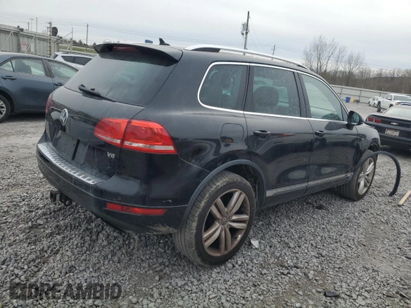 2013 Volkswagen Touareg Lux with VIN WVGEF9BP2DD006847, listed as a Copart auction lot 87613955 with 157,200 mi miles and Salvage Title. Bid and sale history available at DreamBid. Image 3.