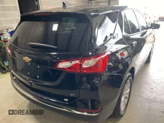 2021 Chevrolet Equinox LT z VIN 3GNAXJEV2ML379402, wystawiony jako IAAI lot #42504649 z przebiegiem 58 647 mil mil oraz . Historia ofert i sprzedaży dostępna na DreamBid. Obrazek 2.