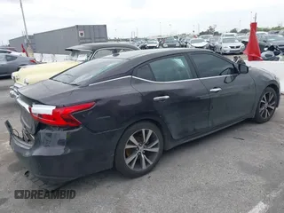 2016 Nissan Maxima SV z VIN 1N4AA6AP9GC388991, wystawiony jako IAAI lot #42110609 z przebiegiem 139 467 mil mil oraz . Historia ofert i sprzedaży dostępna na DreamBid. Obrazek 4.