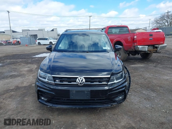 2021 Volkswagen Tiguan SE with VIN 3VV2B7AX1MM101432, listed as a IAAI auction lot 41982286 with 72,252 mi miles and . Bid and sale history available at DreamBid. Image 12.