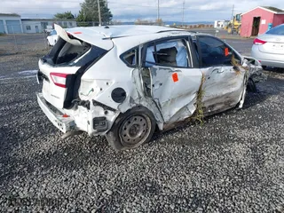 2018 Subaru Impreza with VIN 4S3GTAA62J3742382, listed as a IAAI auction lot 40836283 with 69,574 mi miles. Bid and sale history available at carsss.com. Image 4.