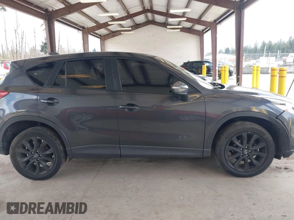 2015 Mazda CX-5 Grand Touring with VIN JM3KE2DY0F0508796, listed as a IAAI auction lot 41798482 with 110,260 mi miles. Bid and sale history available at carsss.com. Image 13.