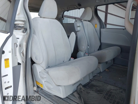 2014 Toyota Sienna LE AAS with VIN 5TDKK3DC2ES434546, listed as a IAAI auction lot 42227745 with 175,445 mi miles and . Bid and sale history available at DreamBid. Image 8.