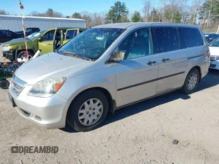 2005 Honda Odyssey LX with VIN 5FNRL382X5B097268, listed as a IAAI auction lot 40809971 with 286,685 mi miles and . Bid and sale history available at DreamBid. Image 2.