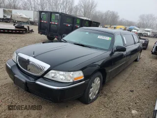 2003 Lincoln Town Car Executive z VIN 1L1FM81W33Y653215, wystawiony jako Copart lot #84396364 z przebiegiem Nie podano mil oraz Szkoda całkowita • Salvage title. Historia ofert i sprzedaży dostępna na DreamBid. Obrazek 2.
