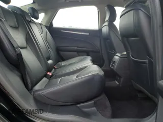 2017 Ford Fusion Titanium z VIN 3FA6P0K92HR192881, wystawiony jako Copart lot #61190515 z przebiegiem 109 834 mil mil oraz Szkoda całkowita • Salvage title. Historia ofert i sprzedaży dostępna na DreamBid. Obrazek 10.