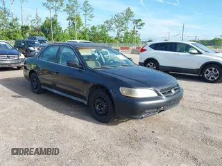 2002 Honda Accord LX with VIN 1HGCG65562A135742, listed as a IAAI auction lot 42641910 with 213,697 mi miles and . Bid and sale history available at DreamBid. Image 1.
