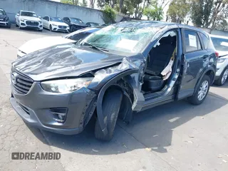 2016 Mazda CX-5 Touring with VIN JM3KE2CY6G0832967, listed as a IAAI auction lot 41943527 with 1 mi miles. Bid and sale history available at carsss.com. Image 22.