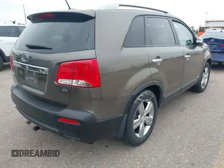 2012 Kia Sorento EX with VIN 5XYKUCA6XCG294104, listed as a IAAI auction lot 42413363 with 57,527 mi miles and . Bid and sale history available at DreamBid. Image 4.