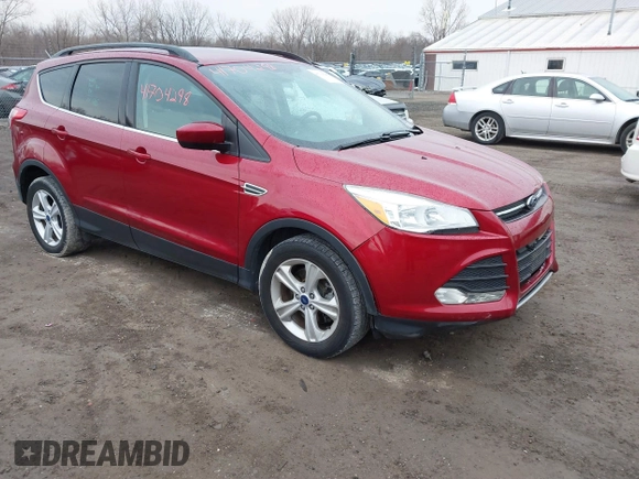 2014 Ford Escape SE with VIN 1FMCU9GX7EUC35483, listed as a IAAI auction lot 41704298 with 105,017 mi miles. Bid and sale history available at carsss.com. Image 1.