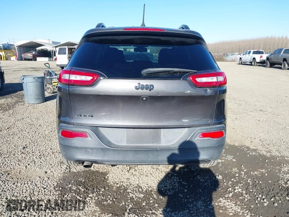2014 Jeep Cherokee Latitude with VIN 1C4PJMCB5EW294631, listed as a IAAI auction lot 41453628 with 127,847 mi miles and . Bid and sale history available at DreamBid. Image 17.