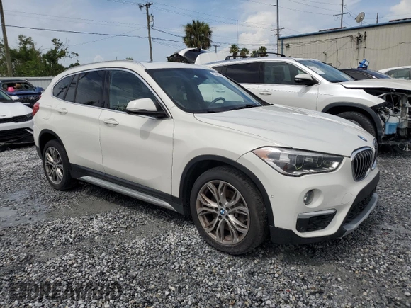 2017 BMW X1 xDrive28i with VIN WBXHT3Z37H4A55614, listed as a Copart auction lot 63491415 with 120,680 mi miles and Salvage title. Bid and sale history available at DreamBid. Image 4.
