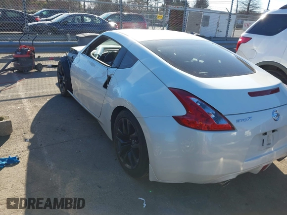 2017 Nissan 370Z with VIN JN1AZ4EHXHM954875, listed as a IAAI auction lot 41641554 with 101,093 mi miles. Bid and sale history available at carsss.com. Image 3.