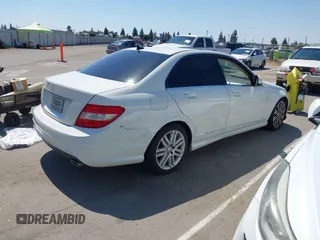 2009 Mercedes-Benz C-Class 3.0L Sport with VIN WDDGF54X09F233877, listed as a IAAI auction lot 42121123 with 215,698 mi miles. Bid and sale history available at carsss.com. Image 4.