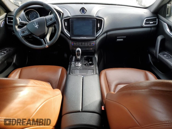 2017 Maserati Ghibli with VIN ZAM57XSAXH1217301, listed as a Copart auction lot 40090954 with 107,514 mi miles. Bid and sale history available at carsss.com. Image 8.