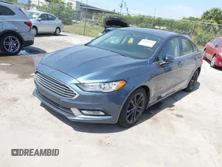 2018 Ford Fusion Hybrid SE with VIN 3FA6P0LU9JR137983, listed as a IAAI auction lot 42087894 with 196,330 mi miles. Bid and sale history available at carsss.com. Image 2.