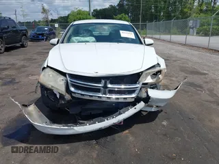 2012 Dodge Avenger SXT with VIN 1C3CDZCB5CN156288, listed as a IAAI auction lot 42115638 with 157,534 mi miles and . Bid and sale history available at DreamBid. Image 6.