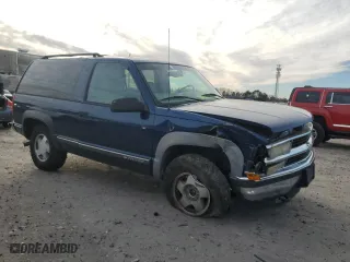 1999 Chevrolet Tahoe with VIN 3GNEK18R4XG124715, listed as a Copart auction lot 84744304 with 276,891 mi miles and Clean Title. Bid and sale history available at carsss.com. Image 4.
