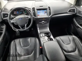 2019 Ford Edge Titanium z VIN 2FMPK4K94KBB36107, wystawiony jako Copart lot #56842925 z przebiegiem 75 348 mil mil oraz Szkoda całkowita • Salvage title. Historia ofert i sprzedaży dostępna na DreamBid. Obrazek 8.