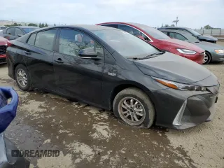 2021 Toyota Prius LE with VIN JTDKAMFP7M3178896, listed as a Copart auction lot 55634965 with 48,576 mi miles and Salvage Title. Bid and sale history available at DreamBid. Image 4.