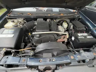 2003 Chevrolet TrailBlazer EXT LT z VIN 1GNET16S136172543, wystawiony jako Copart lot #71079825 z przebiegiem 193 815 mil mil oraz Czysty tytuł • Clean title. Historia ofert i sprzedaży dostępna na DreamBid. Obrazek 11.