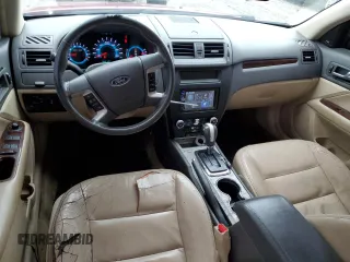 2012 Ford Fusion SEL z VIN 3FAHP0JG2CR309554, wystawiony jako Copart lot #60869895 z przebiegiem 199 134 mil mil oraz Szkoda całkowita • Salvage title. Historia ofert i sprzedaży dostępna na DreamBid. Obrazek 8.