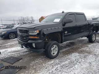 2016 Chevrolet Silverado 1500 LT with VIN 3GCUKREC6GG280645, listed as a IAAI auction lot 41730488 with 144,706 mi miles and . Bid and sale history available at DreamBid. Image 2.