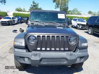 2022 Jeep Wrangler Unlimited Sport S z VIN 1C4HJXDG6NW134306, wystawiony jako IAAI lot #42206796 z przebiegiem 45 303 mil mil oraz . Historia ofert i sprzedaży dostępna na DreamBid. Obrazek 12.