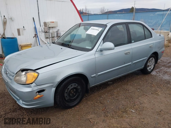 2003 Hyundai Accent GL z VIN KMHCG45C43U465523, wystawiony jako IAAI lot #40883056 z przebiegiem 95 770 mil mil oraz . Historia ofert i sprzedaży dostępna na DreamBid. Obrazek 17.