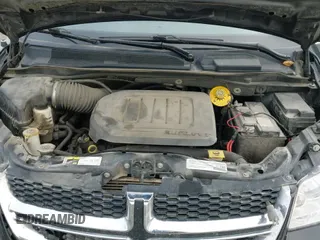 2019 Dodge Grand Caravan SXT with VIN 2C4RDGCG8KR671891, listed as a IAAI auction lot 43378093 with 119,528 mi miles and . Bid and sale history available at DreamBid. Image 18.