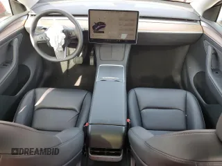 2024 Tesla Model Y с VIN 7SAYGDED3RF166676, выставлен на аукционе Copart как лот 60792165 с пробегом 22 445 миль миль и Списание • Salvage title. История ставок и продаж доступна на DreamBid. Изображение 8.