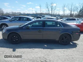 2012 Chevrolet Malibu 1LS with VIN 1G1ZB5E08CF344225, listed as a IAAI auction lot 42055285 with 148,304 mi miles and . Bid and sale history available at DreamBid. Image 14.