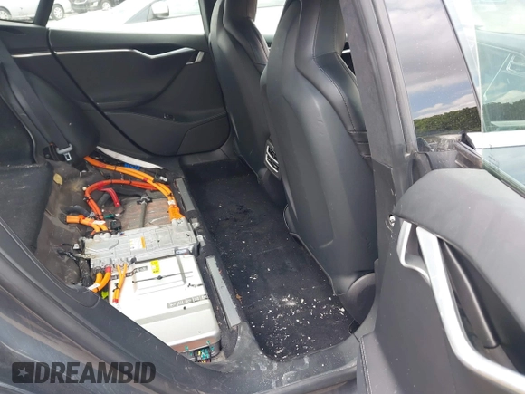 2016 Tesla Model S 90D with VIN 5YJSA1E25GF129482, listed as a IAAI auction lot 42588913 with 101,790 mi miles and . Bid and sale history available at DreamBid. Image 8.