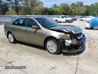 2012 Ford Fusion Hybrid with VIN 3FADP0L3XCR267935, listed as a Copart auction lot 54770805 with 144,794 mi miles and Salvage title. Bid and sale history available at DreamBid. Image 4.