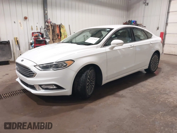 2017 Ford Fusion Titanium with VIN 3FA6P0K98HR124178, listed as a IAAI auction lot 42207938 with 89,352 mi miles and . Bid and sale history available at DreamBid. Image 2.