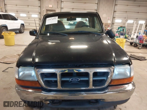 1999 Ford Ranger XL with VIN 1FTZR15V4XPB56809, listed as a IAAI auction lot 41874991 with 165,487 mi miles. Bid and sale history available at carsss.com. Image 12.