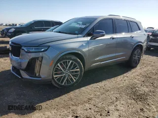 2022 Cadillac XT6 Sport with VIN 1GYKPGRS3NZ142843, listed as a Copart auction lot 47843925 with 26,668 mi miles and Salvage Title. Bid and sale history available at carsss.com. Image 1.
