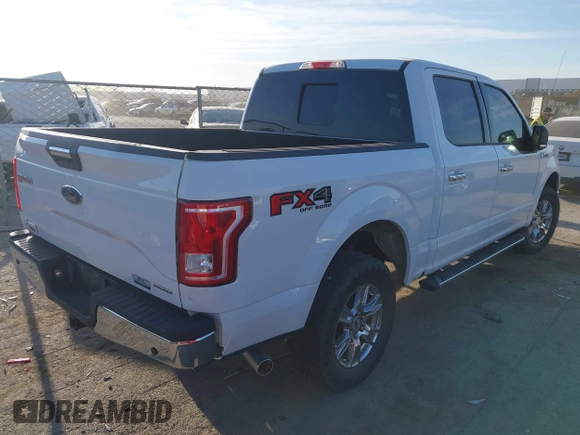 2015 Ford F-150 XLT with VIN 1FTEW1EF1FFA15054, listed as a IAAI auction lot 41780219 with 185,059 mi miles. Bid and sale history available at carsss.com. Image 4.