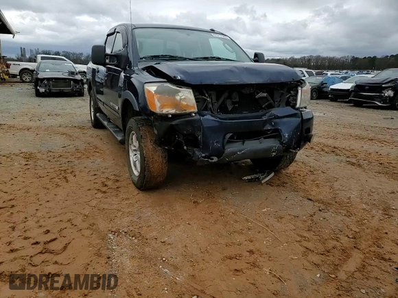 2011 Nissan Titan Pro-4X z VIN 1N6BA0EC0BN322228, wystawiony jako Copart lot #47617305 z przebiegiem 189 151 mil mil oraz Szkoda całkowita • Salvage title. Historia ofert i sprzedaży dostępna na DreamBid. Obrazek 11.