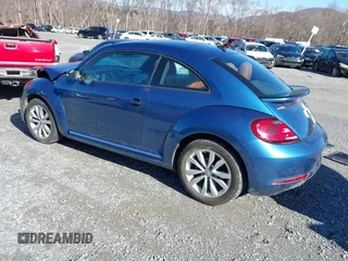 2017 Volkswagen Beetle 1.8T Fleet with VIN 3VWF17ATXHM630753, listed as a IAAI auction lot 41516106 with 62,841 mi miles. Bid and sale history available at carsss.com. Image 3.