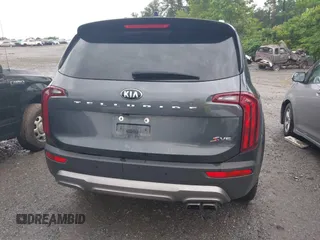 2021 Kia Telluride S with VIN 5XYP64HC8MG127498, listed as a IAAI auction lot 42371890 with 100,748 mi miles and . Bid and sale history available at DreamBid. Image 16.