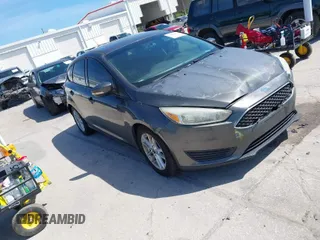 2015 Ford Focus SE with VIN 1FADP3K20FL328559, listed as a IAAI auction lot 41878412 with 153,463 mi miles. Bid and sale history available at carsss.com. Image 1.